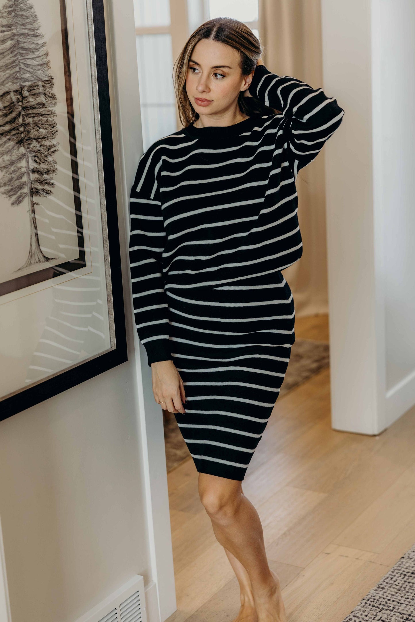 STRIPED KNIT SWEATER IN BLACK