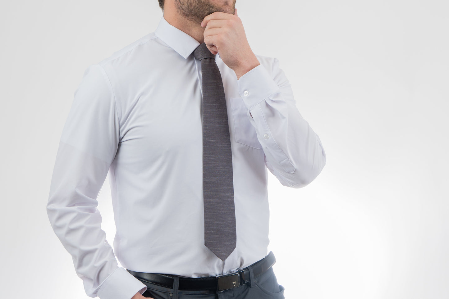 Man wearing a cool, modern, charcoal gray necktie