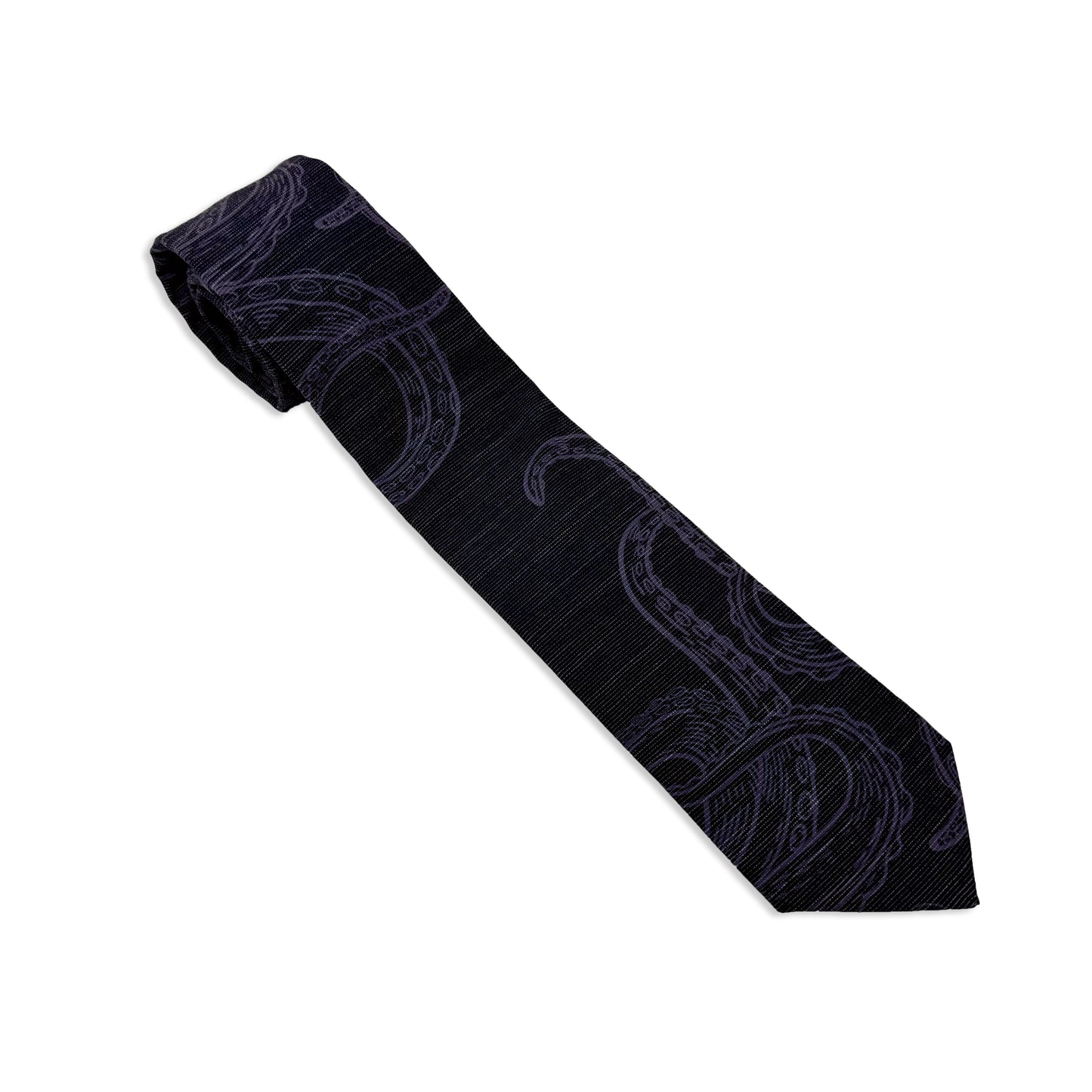Photo of a men's necktie with an octopus on it. Elegant wedding tie from Kator Shop — designed in Utah for timeless wedding style that photographs perfectly.
