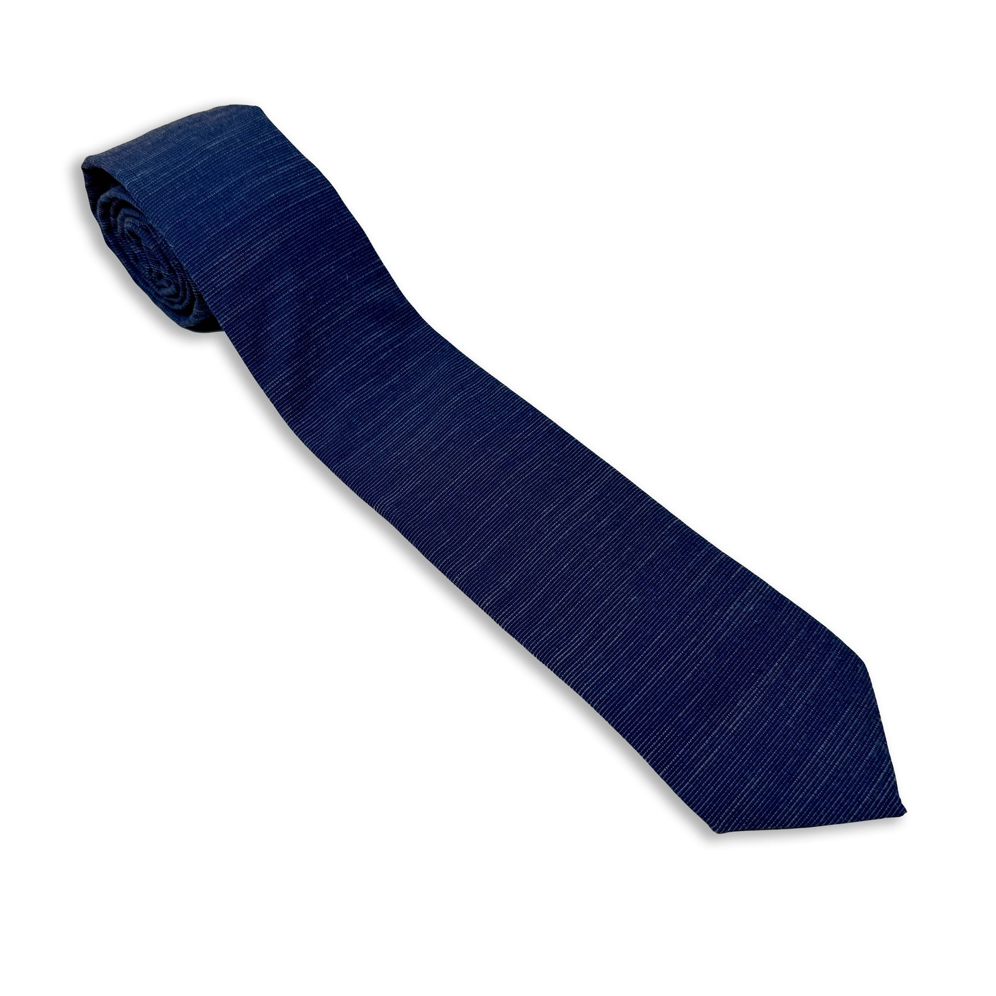 A cool, modern, navy blue men's necktie. Missionary tie built to last through daily wear — crafted in Logan, Utah by Kator Shop for elders serving around the world.