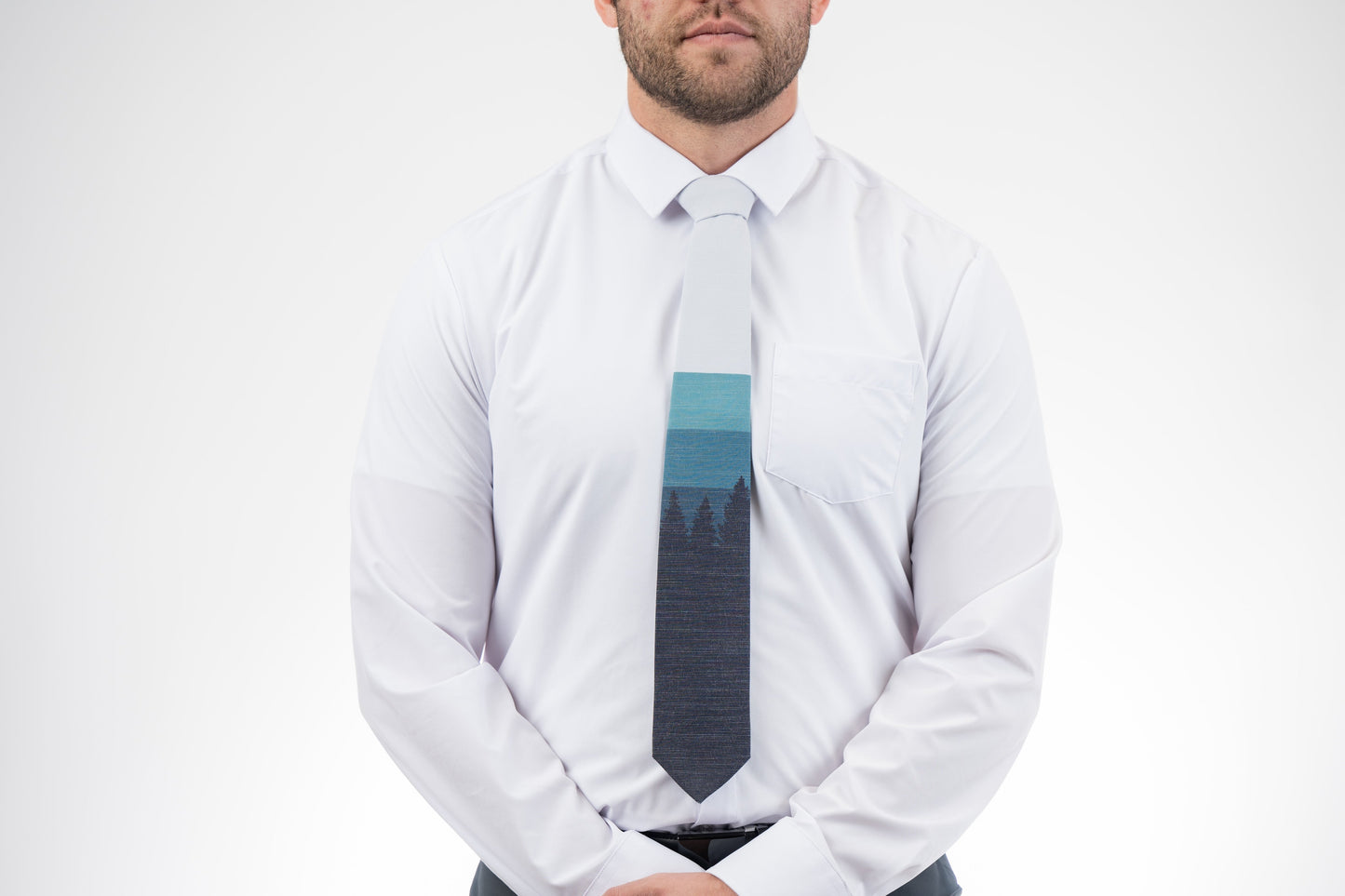 Sunrise Pines (blue-gray) Men's Tie Business tie from Kator Shop in Logan, Utah — premium material designed for confidence and all-day comfort at work.