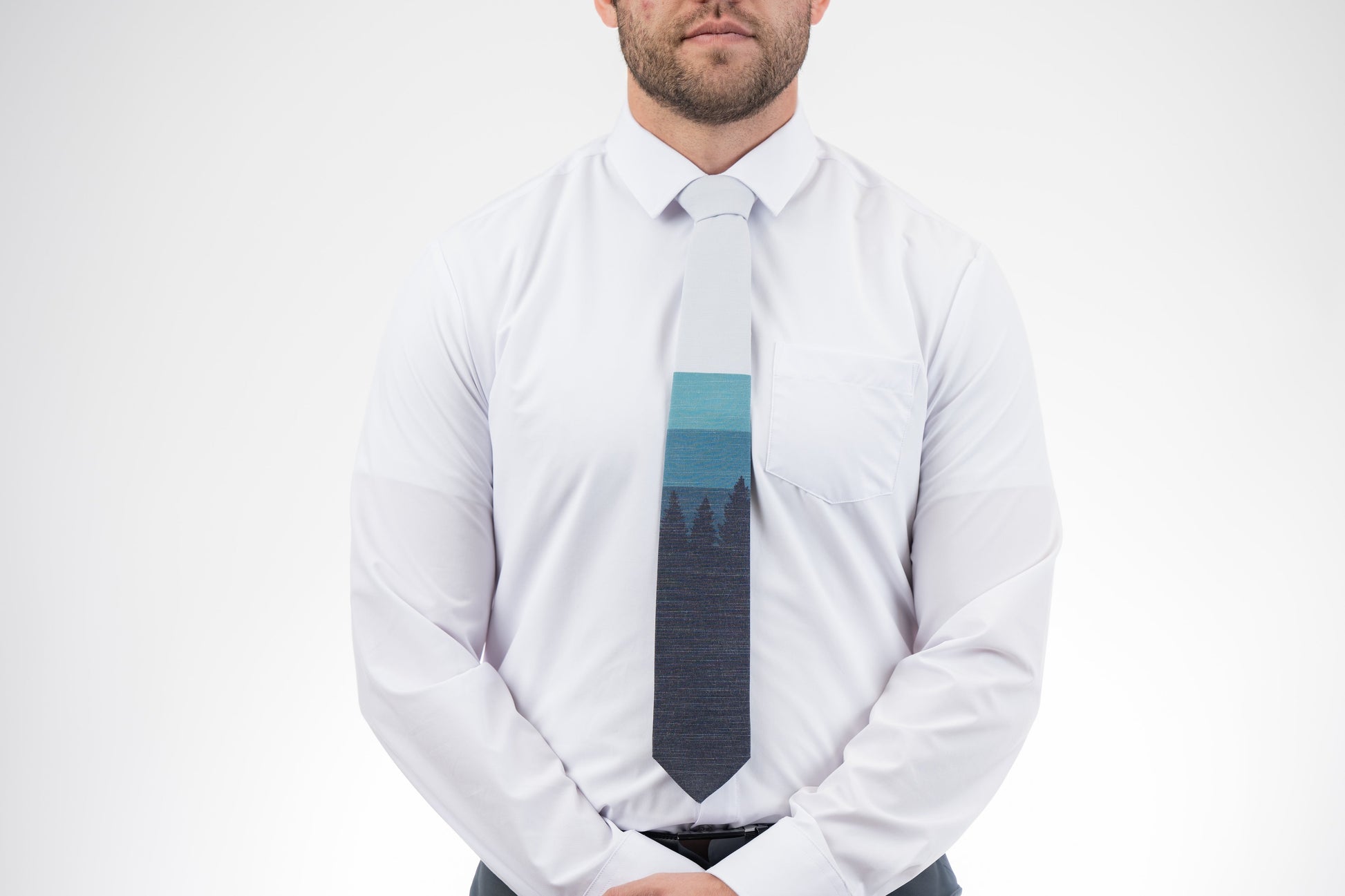 Sunrise Pines (blue-gray) Men's Tie Business tie from Kator Shop in Logan, Utah — premium material designed for confidence and all-day comfort at work.